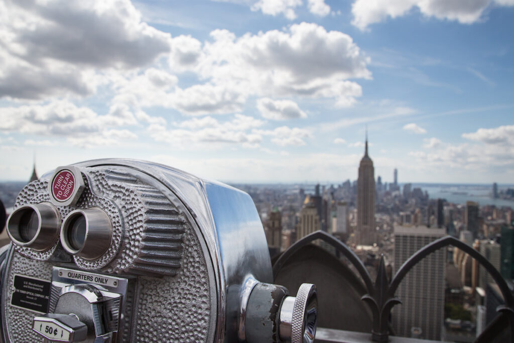 View of Midtown Manhattan New York City with coin-operated telescope